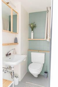 a bathroom with a toilet and a sink at BnB Casa Bellavista Sant Abbondio 6577 Ranzo in Gerra +60 photos