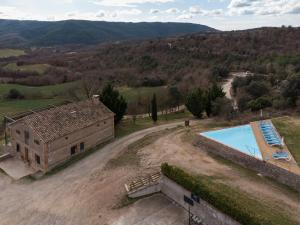 Bazén v ubytování El Pujol nebo v jeho okolí