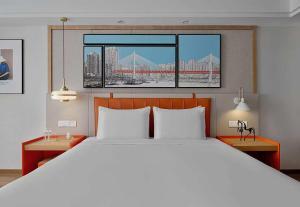 Postel nebo postele na pokoji v ubytování OneJasper Horizon Hotel