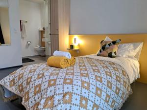 Postel nebo postele na pokoji v ubytování N's Hotel - Self-Check-in Hotel