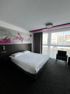 Postel nebo postele na pokoji v ubytování B&B HOTEL Bytom + 18 fotografií
