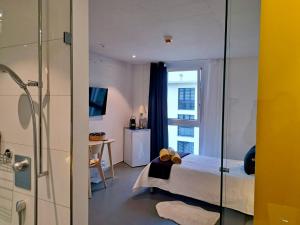 Postel nebo postele na pokoji v ubytování N's Hotel - Self-Check-in Hotel
