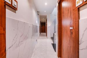 加姆布FabExpress Utsav Residency - Nr Panvel Railway Station的相册照片