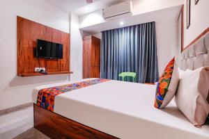 FabExpress Utsav Residency - Nr Panvel Railway Station客房内的一张或多张床位