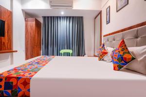 FabExpress Utsav Residency - Nr Panvel Railway Station客房内的一张或多张床位