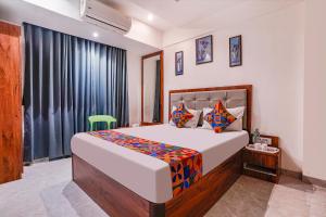 FabExpress Utsav Residency - Nr Panvel Railway Station客房内的一张或多张床位