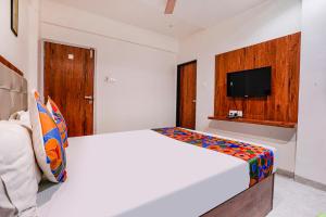 FabExpress Utsav Residency - Nr Panvel Railway Station客房内的一张或多张床位
