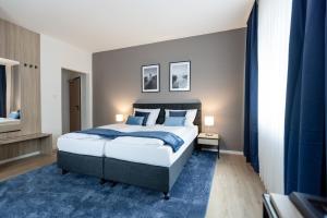 Postel nebo postele na pokoji v ubytování Hotel Wegener