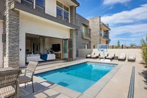 a home with a swimming pool and patio furniture at Bunker on the 8th in Washington