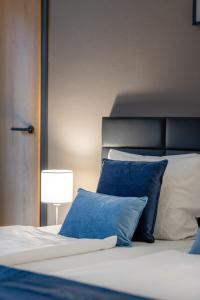 Postel nebo postele na pokoji v ubytování Hotel Wegener