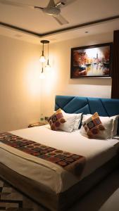 Letto o letti in una camera di Skymax hotel