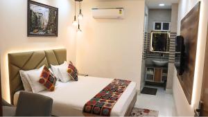 Letto o letti in una camera di Skymax hotel