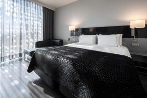 Posteľ alebo postele v izbe v ubytovaní Eurostars Palace