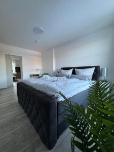 Giường trong phòng chung tại Family & Friends Apartment +55 ảnh