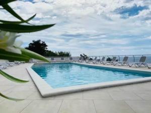 a swimming pool on the roof of a resort at Welcoming house in Vibo Valentia with shared pool in Vibo Valentia