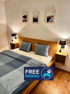 Posteľ alebo postele v izbe v ubytovaní Zielone Apartamenty Katowice Chorzów