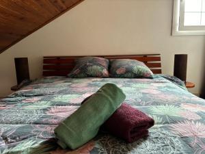 Postel nebo postele na pokoji v ubytování Ti'Kratèr Chambres d'hôtes