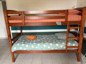 Postel nebo postele na pokoji v ubytování Ti'Kratèr Chambres d'hôtes