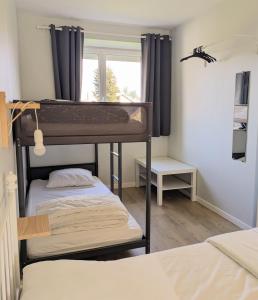 Postel nebo postele na pokoji v ubytování comme à la maison
