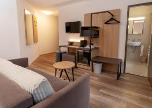 TV a/nebo společenská místnost v ubytování Hotel Restaurant Kreuz