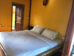 Postel nebo postele na pokoji v ubytování Pai resort pageryaw