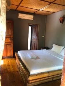 Postel nebo postele na pokoji v ubytování Pai resort pageryaw