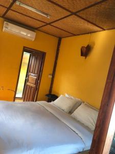 Postel nebo postele na pokoji v ubytování Pai resort pageryaw