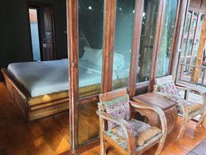 Postel nebo postele na pokoji v ubytování Pai resort pageryaw