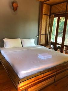 Postel nebo postele na pokoji v ubytování Pai resort pageryaw