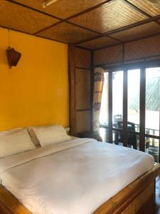 Postel nebo postele na pokoji v ubytování Pai resort pageryaw
