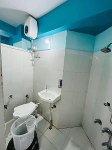 Koupelna v ubytování Hotel Dev Palace + 7 fotografií