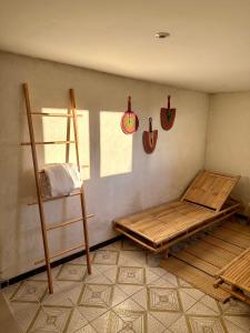 a room with a bunk bed and a ladder at Zita Ferienhäuser - Ferienhaus Burgi in Neckargemünd