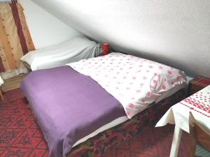 Posteľ alebo postele v izbe v ubytovaní Drevenica Viki 1