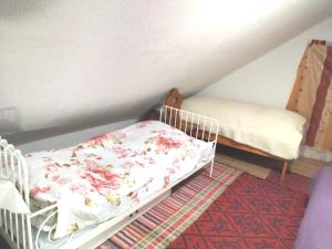 Posteľ alebo postele v izbe v ubytovaní Drevenica Viki 1