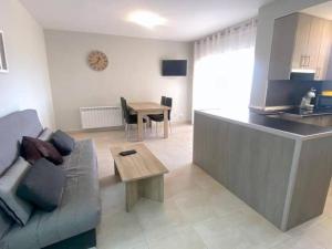 A kitchen or kitchenette at OLIMPE 2 8