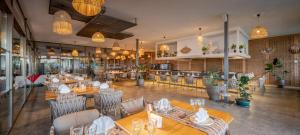 A restaurant or other place to eat at Delphin BE Grand Resort
