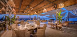 A restaurant or other place to eat at Delphin BE Grand Resort