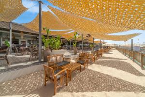 A restaurant or other place to eat at Delphin BE Grand Resort