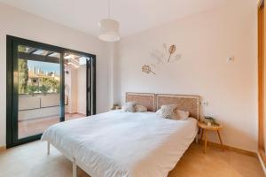 Katil atau katil-katil dalam bilik di El Oasis Monaco 10 1B +18 gambar