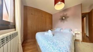 Postel nebo postele na pokoji v ubytování La Casa de Ra - tucasaenlospirineos