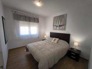 Posteľ alebo postele v izbe v ubytovaní Villa Berlín