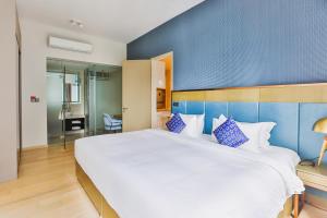 En eller flere senge i et værelse på Star Deluxe Suites KLCC by WSD + 54 billeder