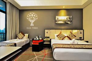 Posteľ alebo postele v izbe v ubytovaní Red M101 Dang Wangi By Oak Tree