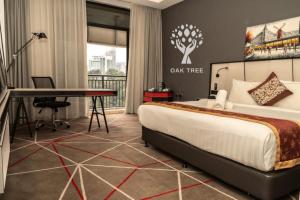 Posteľ alebo postele v izbe v ubytovaní Red M101 Dang Wangi By Oak Tree