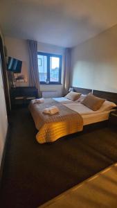 Postel nebo postele na pokoji v ubytování Apartment ZAX B7 in Terra Complex + 37 fotografií