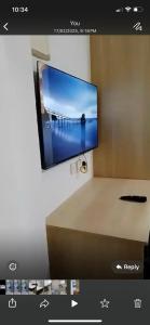 a flat screen tv hanging on a wall at Haven Studio in Nairobi +6 photos