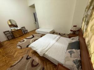 Postel nebo postele na pokoji v ubytování KM Hostel and Tourism