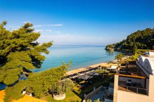 an aerial view of a resort and the water at Olympion Sunset Halkidiki in Fourka