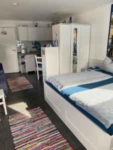 Cama o camas de una habitación en Ferienwohnung Krüger