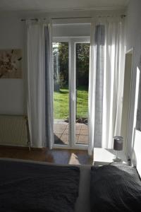 Postel nebo postele na pokoji v ubytování Ferienwohnung Labradoodle